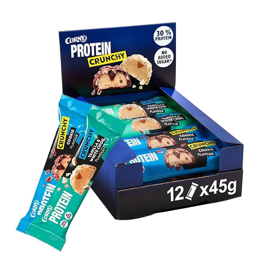 Verpackung mit Corny Protein Crunchy Riegeln. Aufschrift: 30% Protein, ohne Zuckerzusatz. 12 Riegel à 45g.