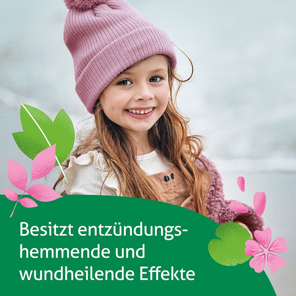 Lächelndes Mädchen. Text: Besitzt entzündungshemmende und wundheilende Effekte. Dekorative Blätter und Blüten.
