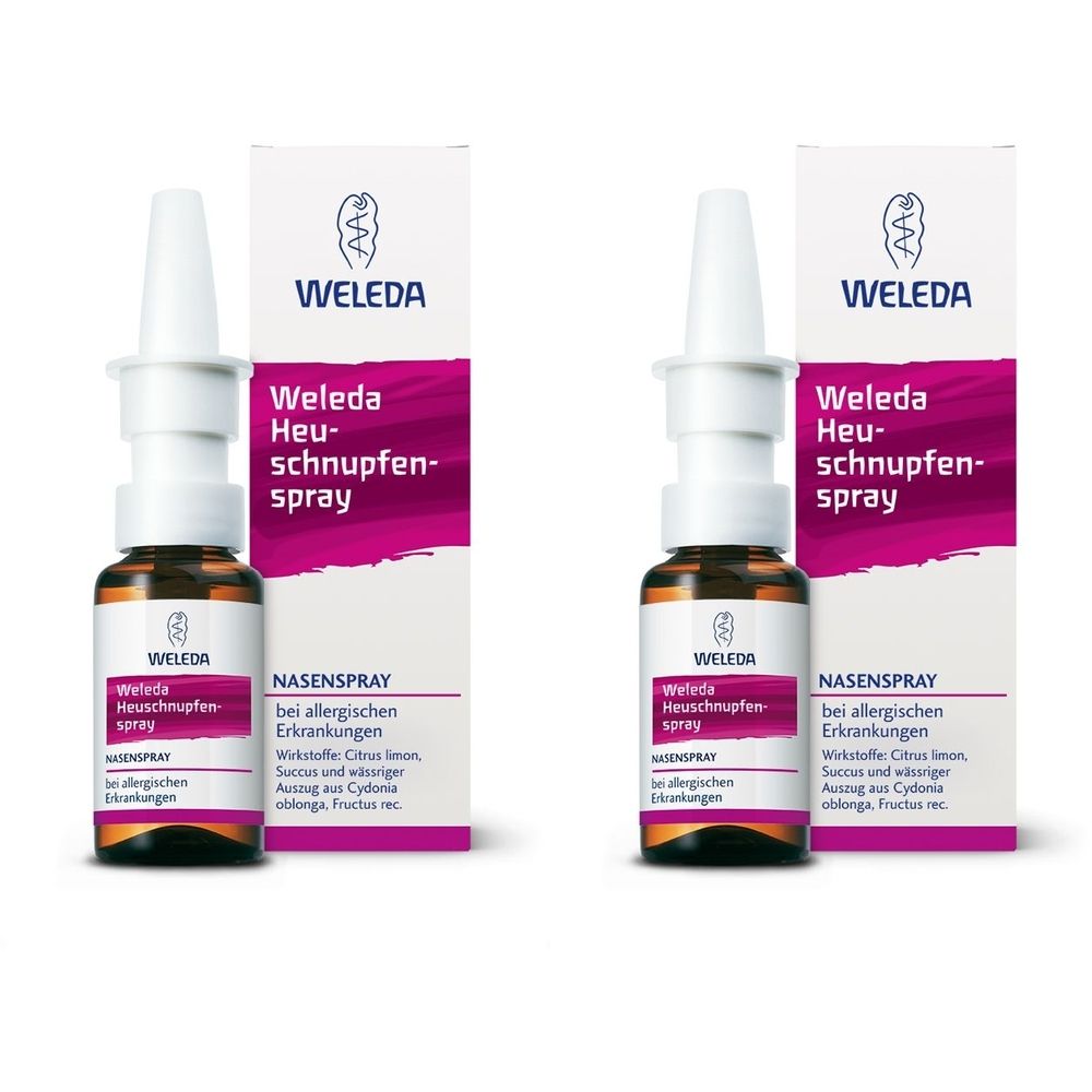 Zwei Nasensprays mit Verpackung. Aufschrift: Weleda Heuschnupfenspray. Flaschen mit weißem Sprühkopf und braunem Glas. Verpackung weiß mit lila Akzenten.