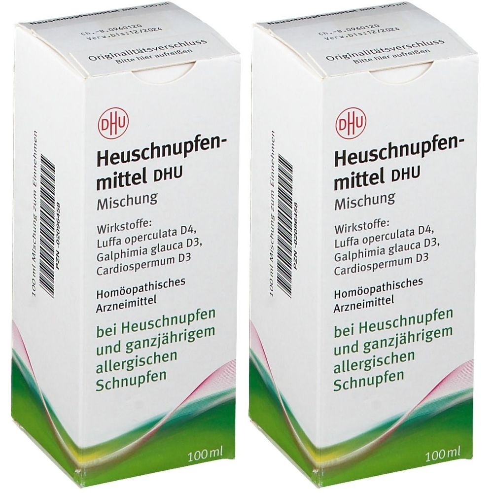 Zwei weiße Kartons mit der Aufschrift "Heuschnupfenmittel DHU Mischung". Text in deutscher Sprache. 100ml.