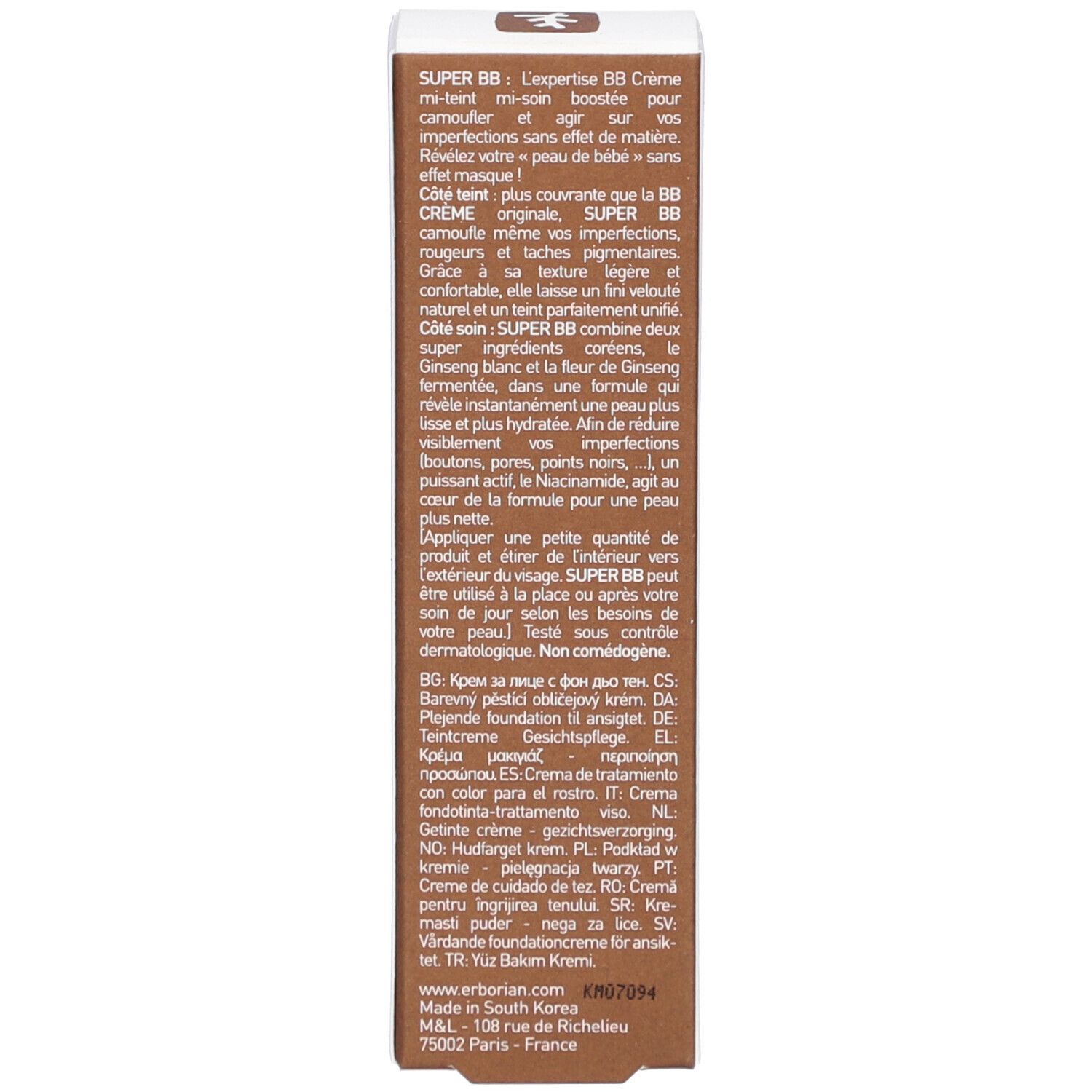 Schmale Produktverpackung. Braune Rückseite mit Text in mehreren Sprachen. Weiße Vorderseite mit Produktnamen.