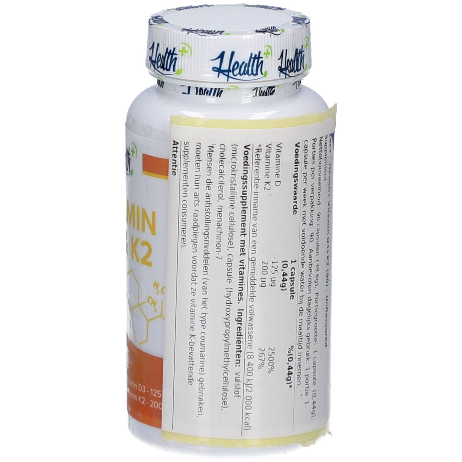 Flasche HEALTH+ VITAMIN D3 & K2 mit teilweise geöffnetem Etikett. Zutaten, Dosierung, Nährwertangaben. 90 Portionen.