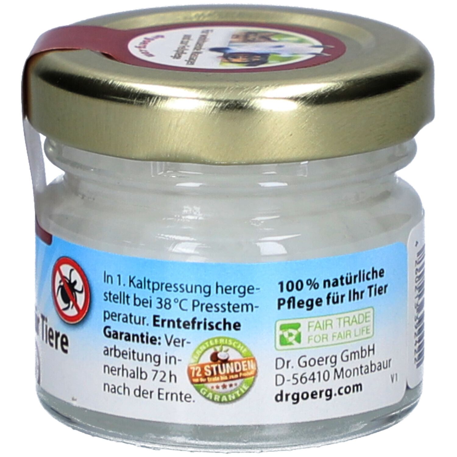 Glas mit Bio-Kokosöl für Tiere. Rückseite mit Text: 100% natürliche Pflege für Ihr Tier. 72 Stunden Garantie. Fair Trade Siegel.