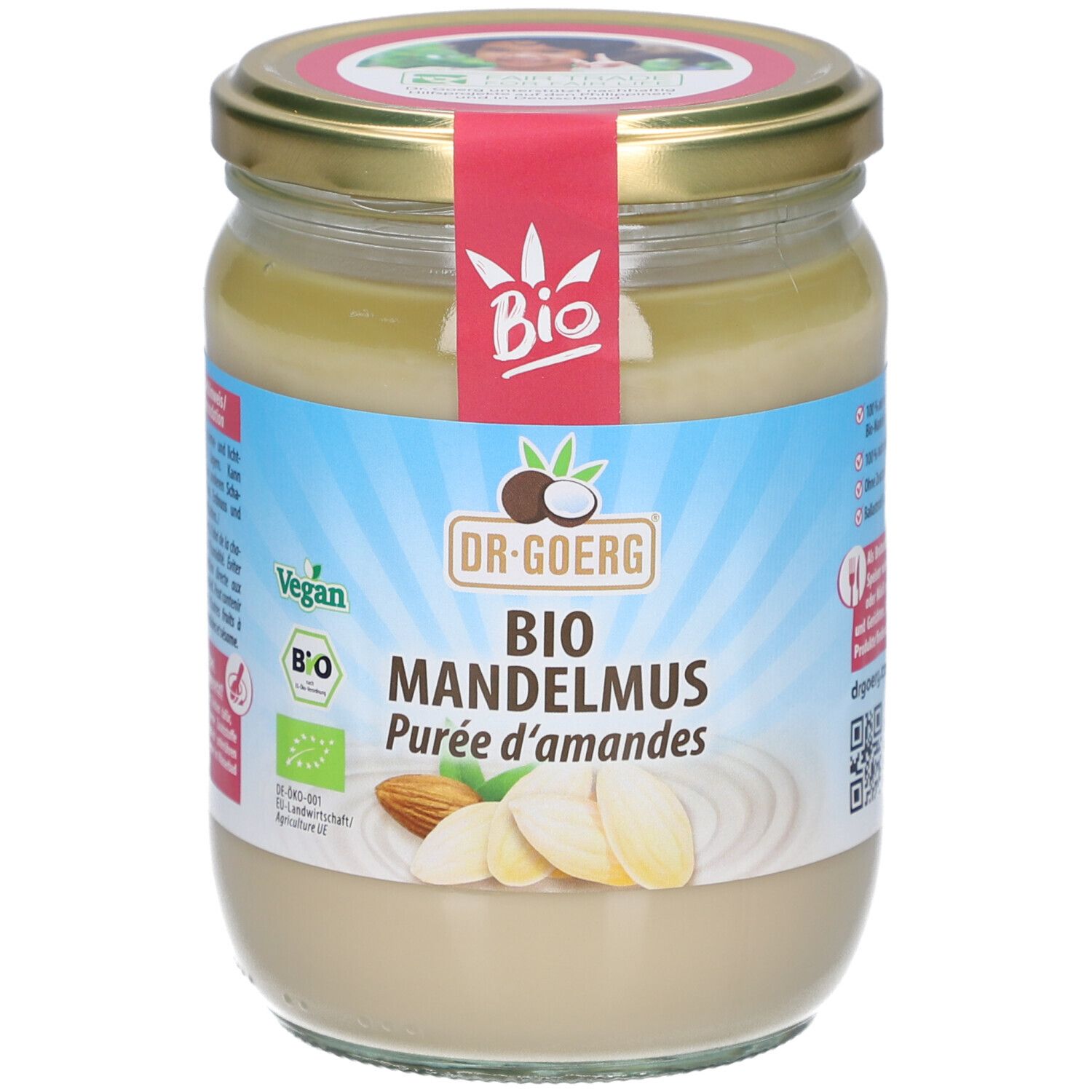 Glas mit Mandelmus. Aufschrift: Bio Mandelmus, Dr. Goerg. Vegan- und Bio-Siegel. Abbildung von Mandeln.