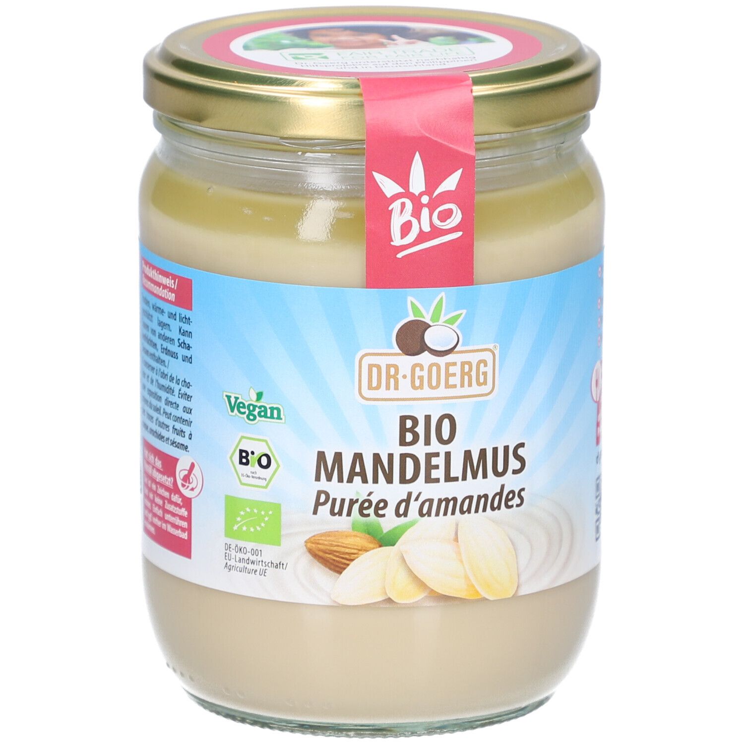 Glas mit Mandelmus. Aufschrift: Bio Mandelmus, Dr. Goerg. Vegan- und Bio-Siegel. Abbildung von Mandeln.