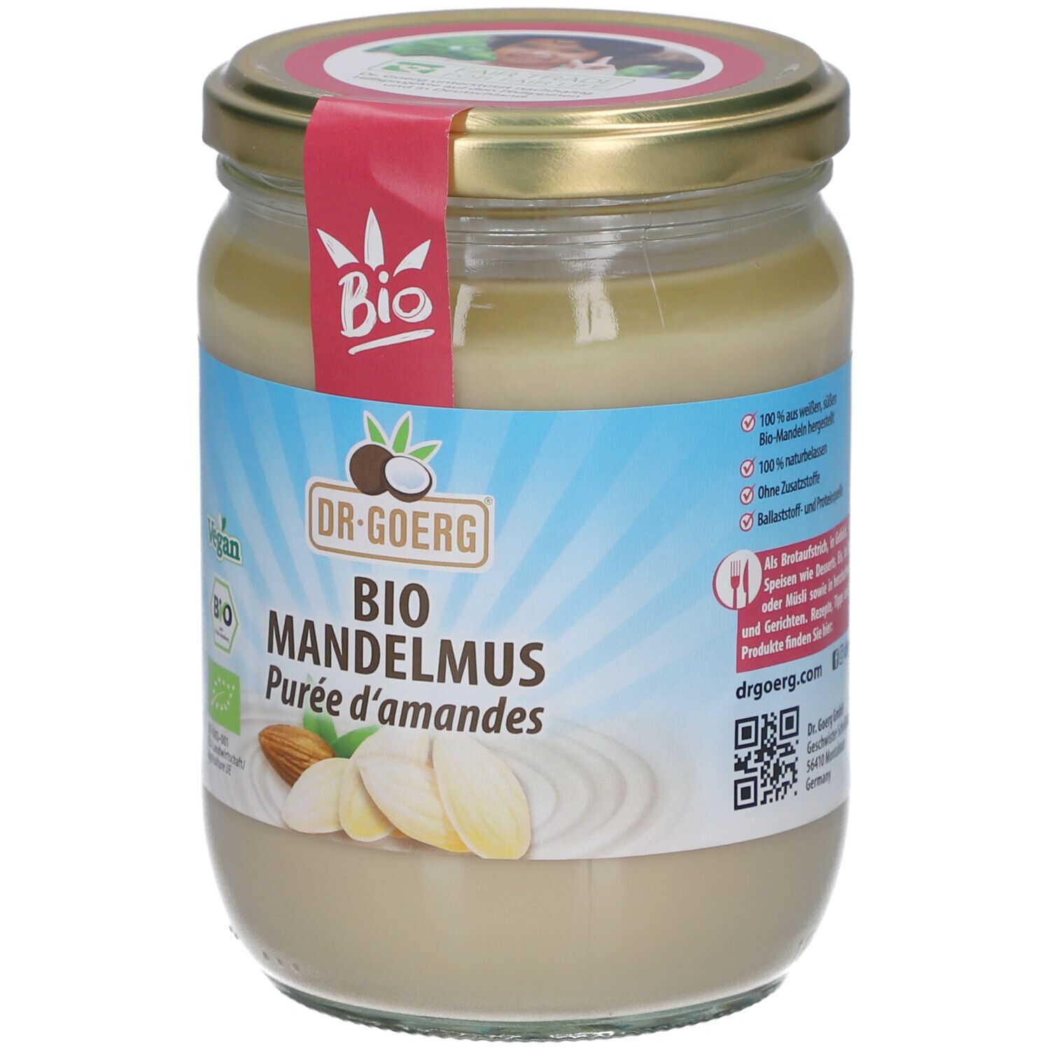 Glas mit Mandelmus. Aufschrift: Bio Mandelmus, Dr. Goerg. Vegan- und Bio-Siegel. Abbildung von Mandeln.