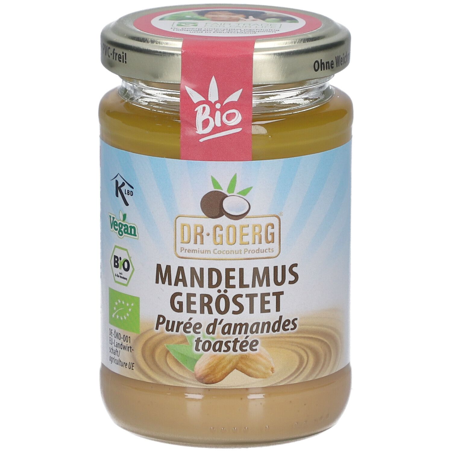 Glas mit Mandelmus, geröstet. Etikett mit Bio-Siegel, Vegan-Logo und Produktname. Deckel mit Aufschrift.