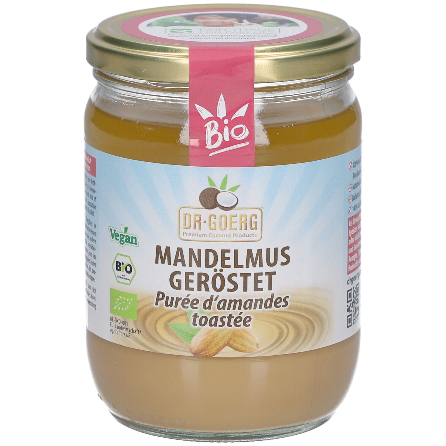 Glas mit Mandelmus, geröstet. Deckel mit Aufkleber "Bio". Aufschrift "DR. GOERG". Vegan und Bio-Siegel.