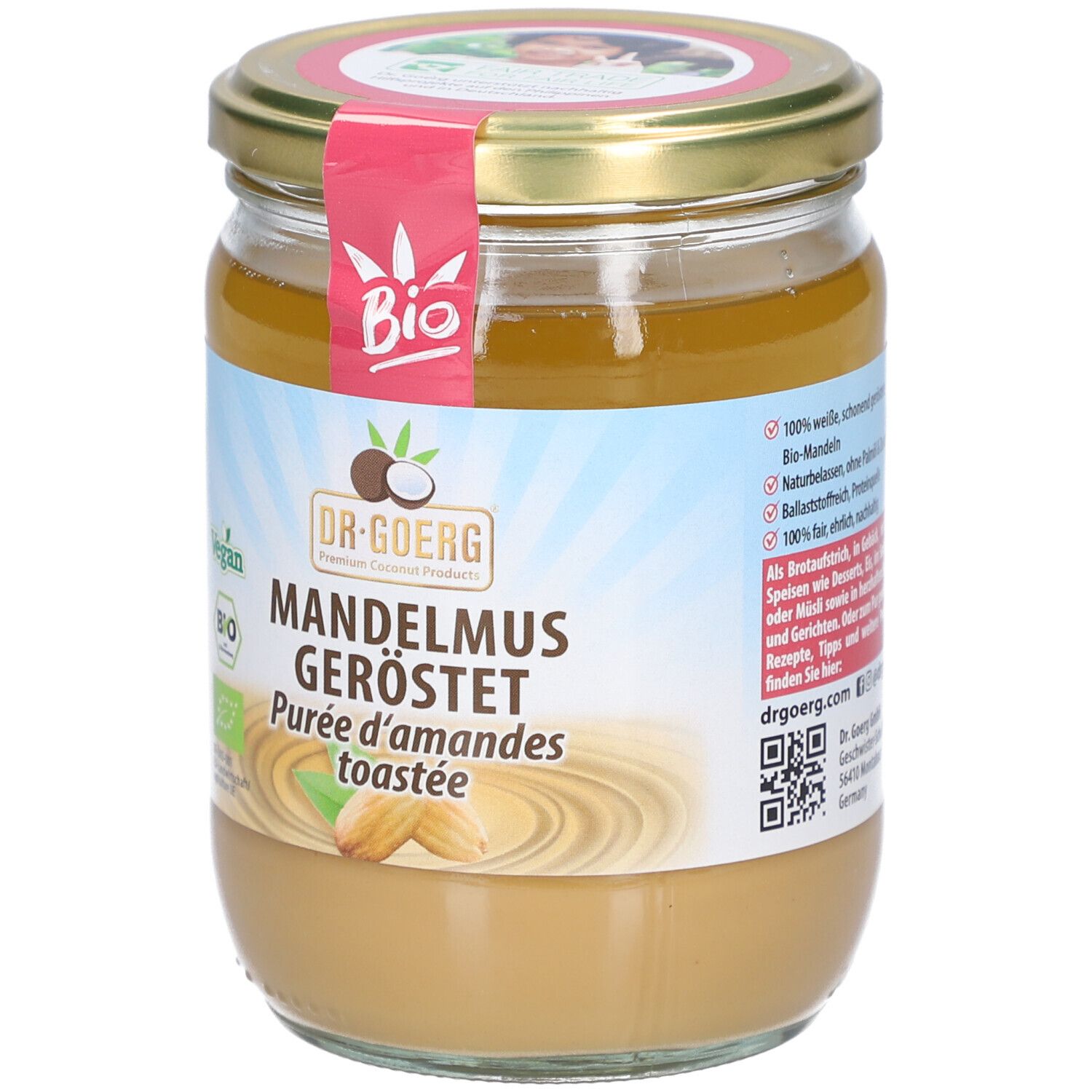 Glas mit Mandelmus, geröstet. Deckel mit Aufkleber "Bio". Aufschrift "DR. GOERG". Vegan und Bio-Siegel.