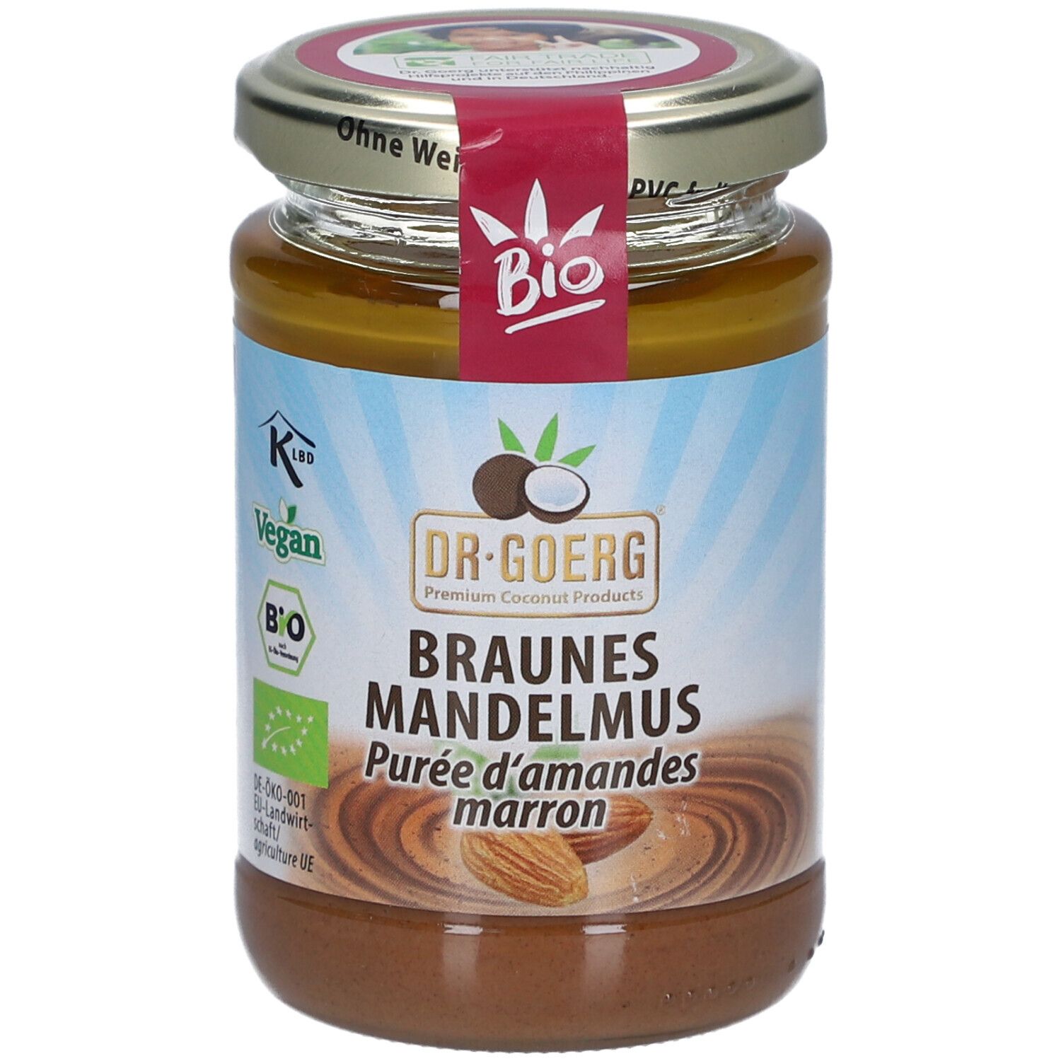 Glas mit braunem Mandelmus. Etikett mit "Bio"-Siegel, "Vegan"-Logo und Produktname "Braunes Mandelmus".