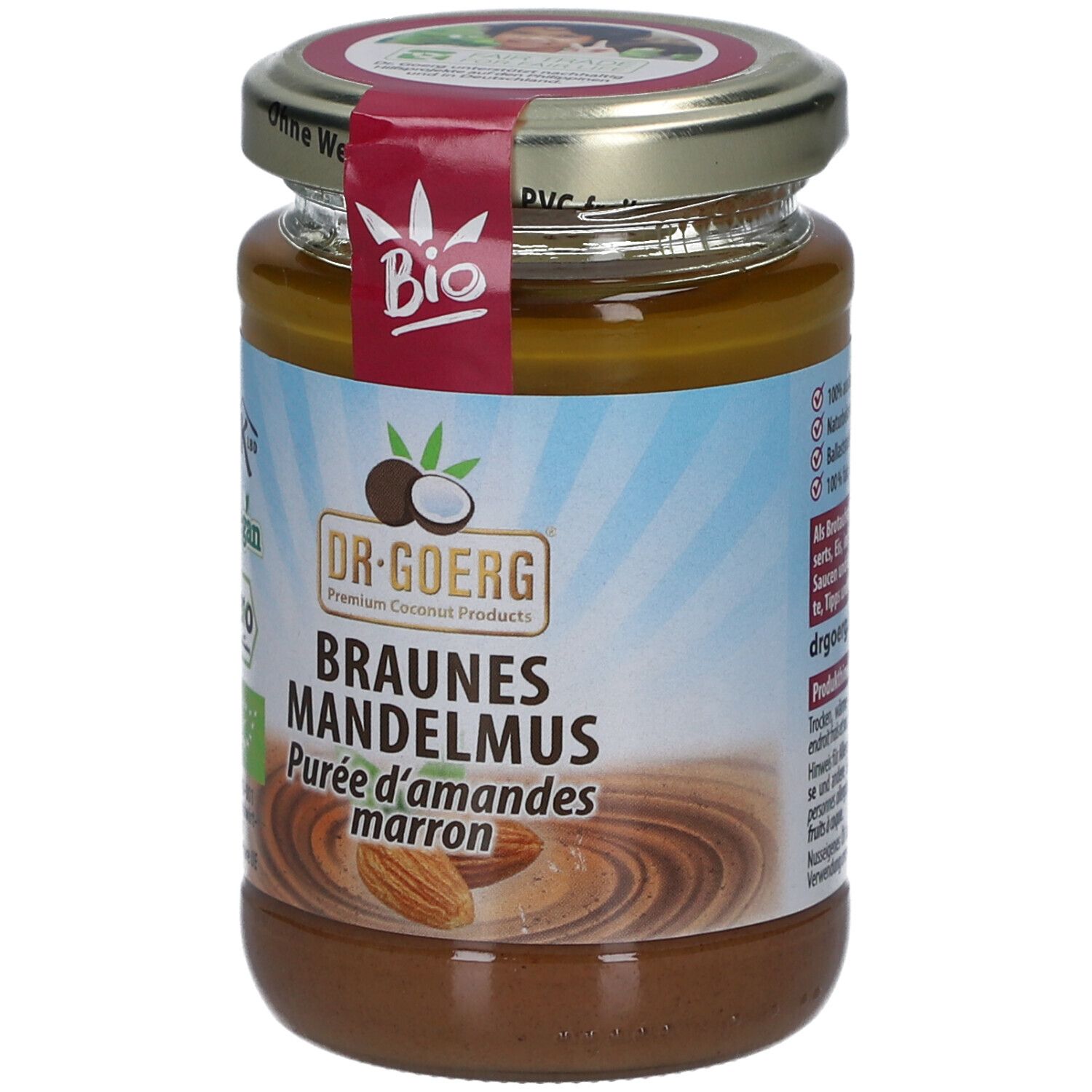 Glas mit braunem Mandelmus. Etikett mit "Bio"-Siegel, "Vegan"-Logo und Produktname "Braunes Mandelmus".
