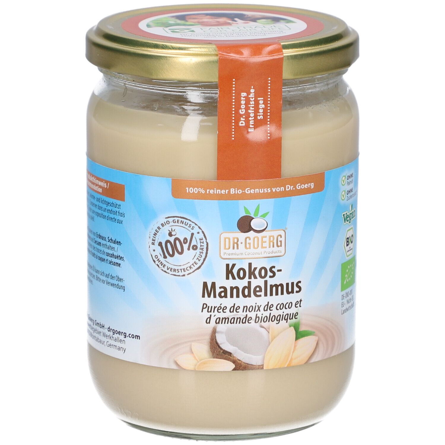Glas mit Kokos-Mandelmus. Etikett mit Produktinformationen und Logo. Deckel goldfarben, Siegel. Bio-Zertifizierung.