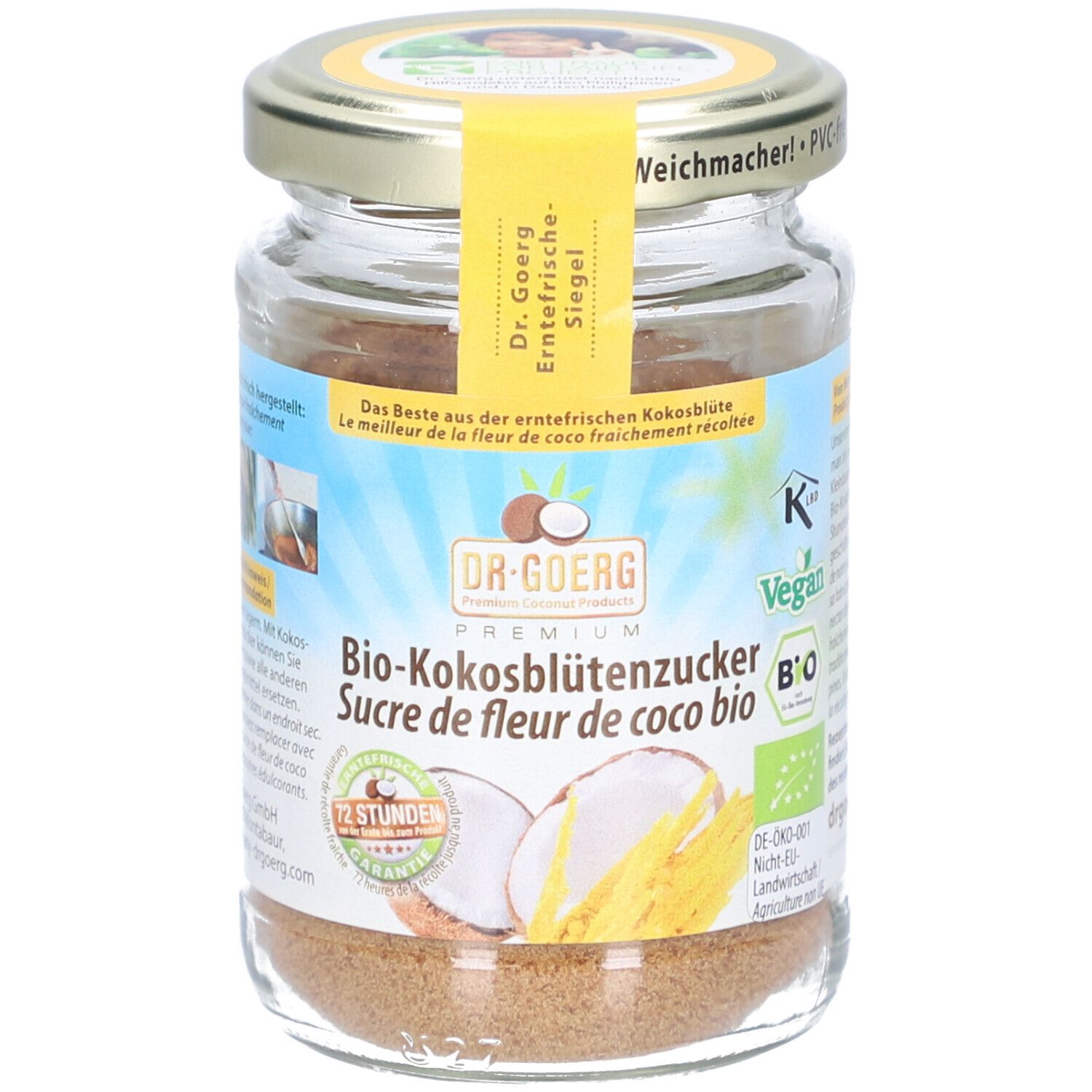 Glas mit Bio-Kokosblütenzucker. Gelbes Etikett mit Produktinformationen. Deckel mit Aufschrift.