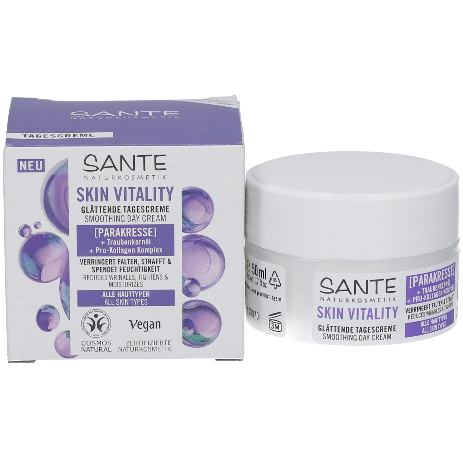 Produktverpackung und Creme-Tiegel. Aufschrift: Sante Skin Vitality Glättende Tagescreme. Enthält Parakresse und Traubenkernöl. Vegan.