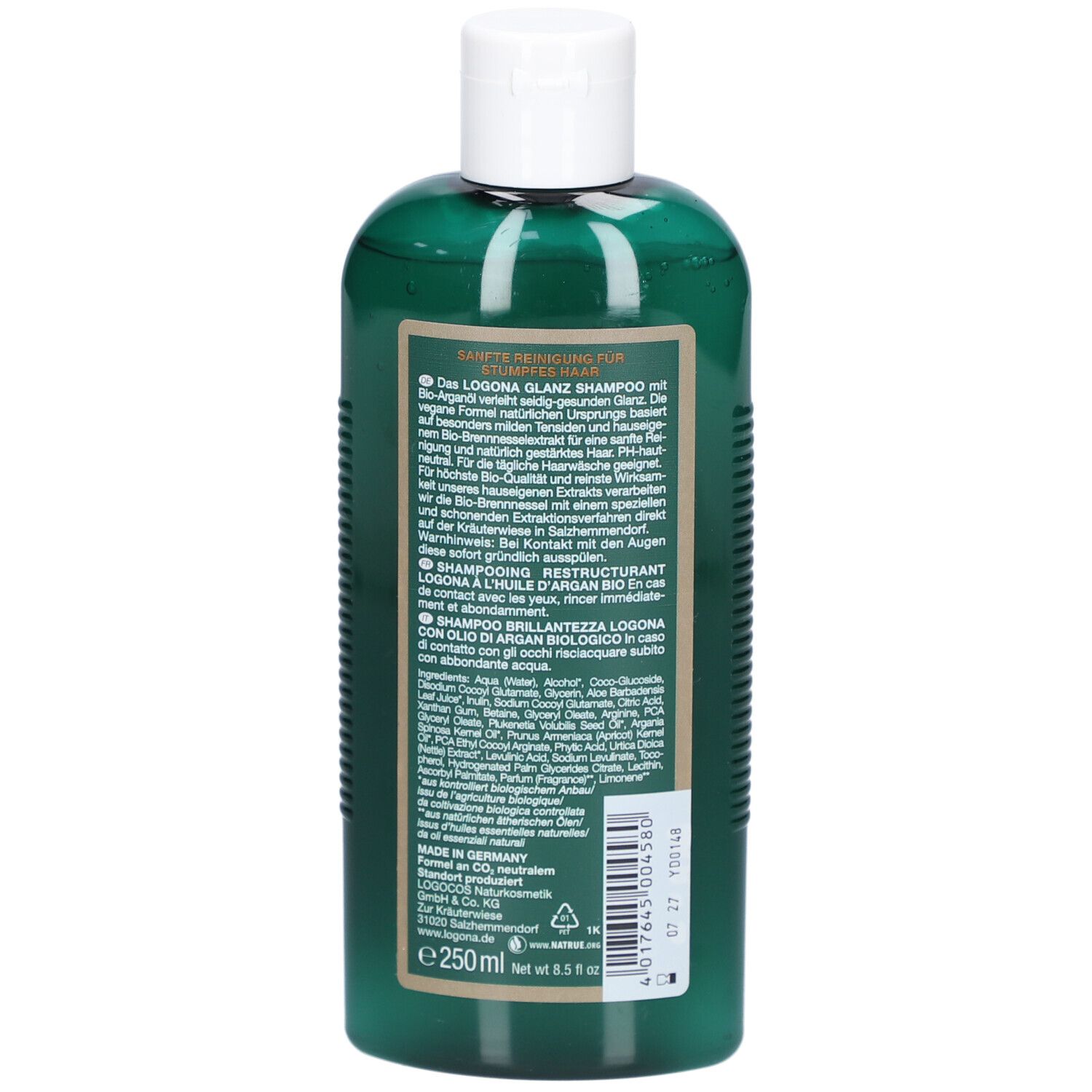 Rückseite der grünen Flasche mit weißem Deckel. Text in Deutsch, Französisch und Italienisch. Volumen: 250 ml.