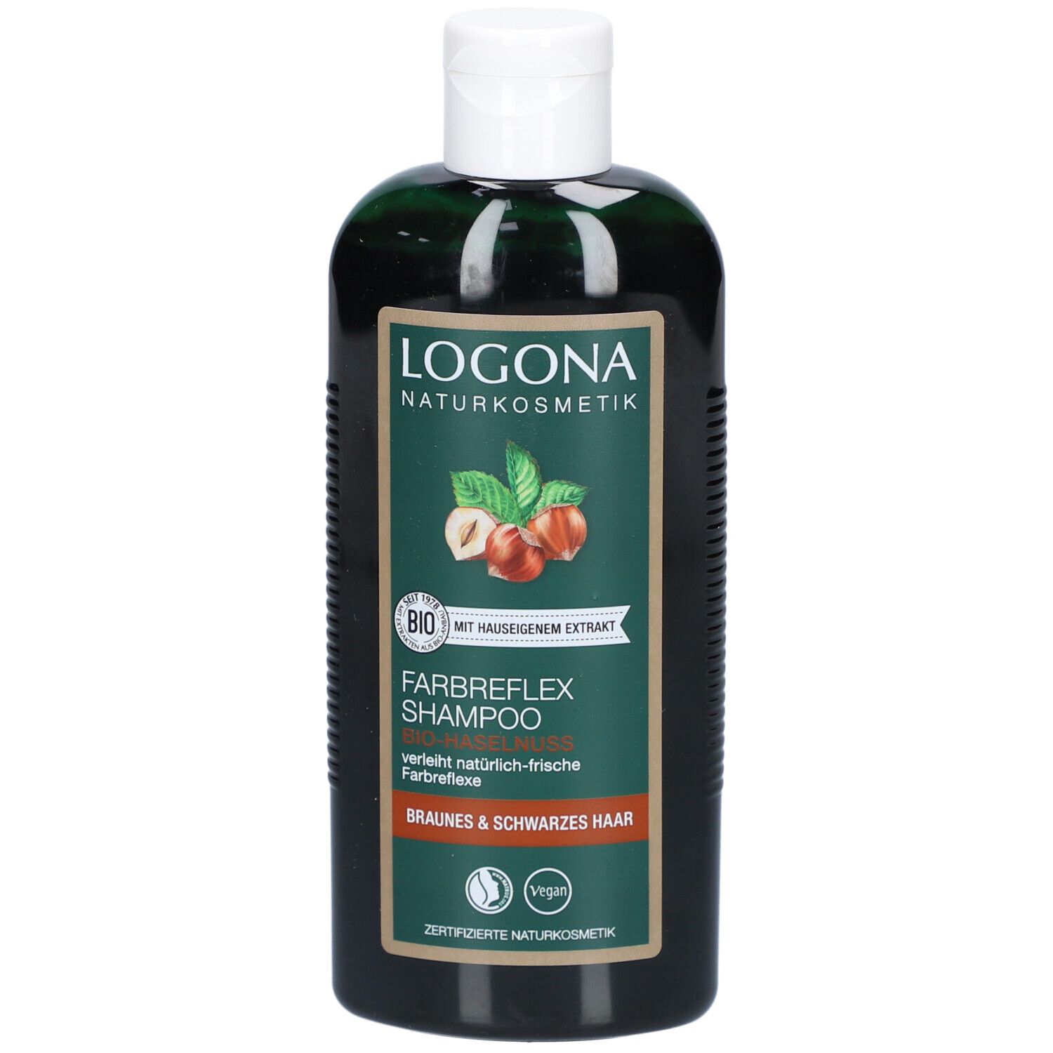 Grüne Flasche mit weißem Deckel. Aufschrift: LOGONA Naturkosmetik, Farbreflex Shampoo, Bio-Haselnuss. Vegan-Siegel.