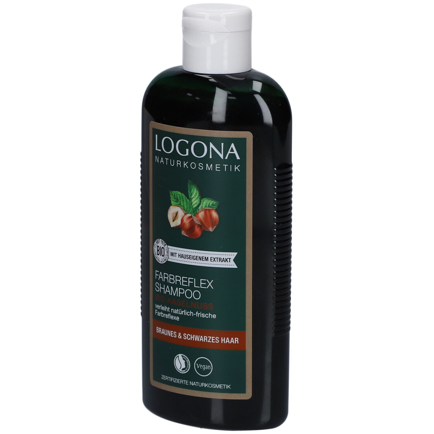 Grüne Flasche mit weißem Deckel. Aufschrift: LOGONA Naturkosmetik, Farbreflex Shampoo, Bio-Haselnuss. Vegan-Siegel.