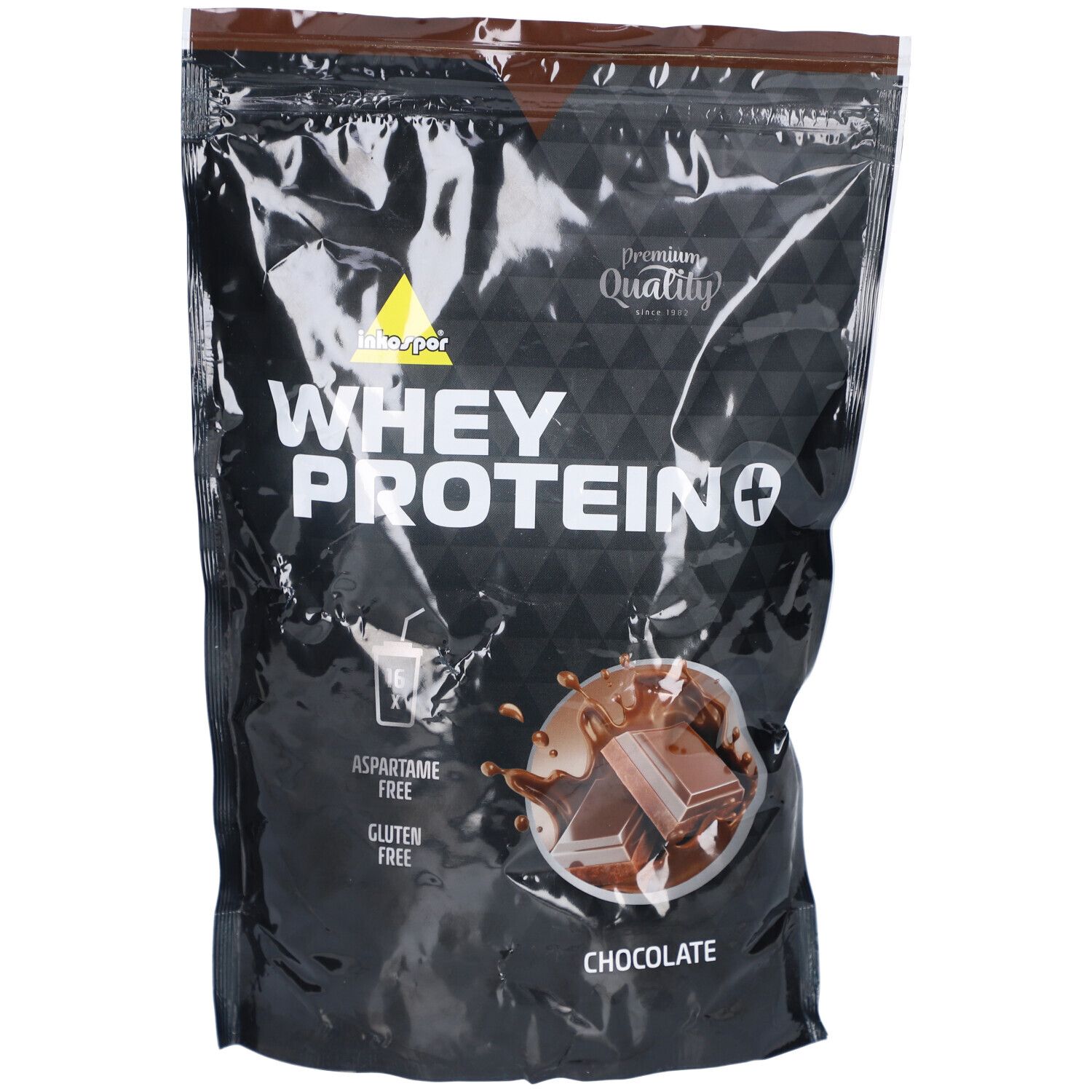 Schwarze Verpackung mit "Whey Protein+" Schriftzug. Schokoladenstück und Spritzer abgebildet. "Aspartame free" und "Gluten free".