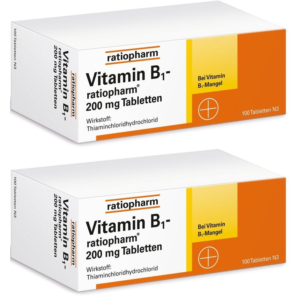 Zwei Packungen Vitamin B1-ratiopharm Tabletten. Weiße Schachteln mit orangefarbenen Akzenten und Produktinformationen.