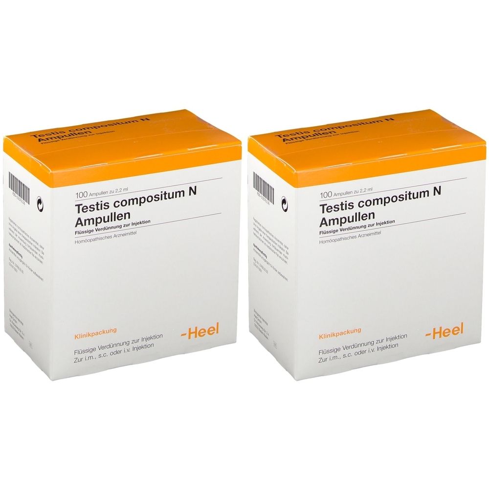 Zwei weiße Kartons mit orangefarbenen Deckeln. Aufschrift: Testis compositum N Ampullen. Marke: Heel.