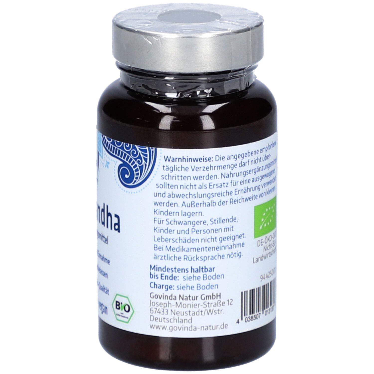 Rückseite einer braunen Flasche mit Kapseln. Aufschrift: Bio-Qualität, Warnhinweise, Mindestens haltbar bis Ende.