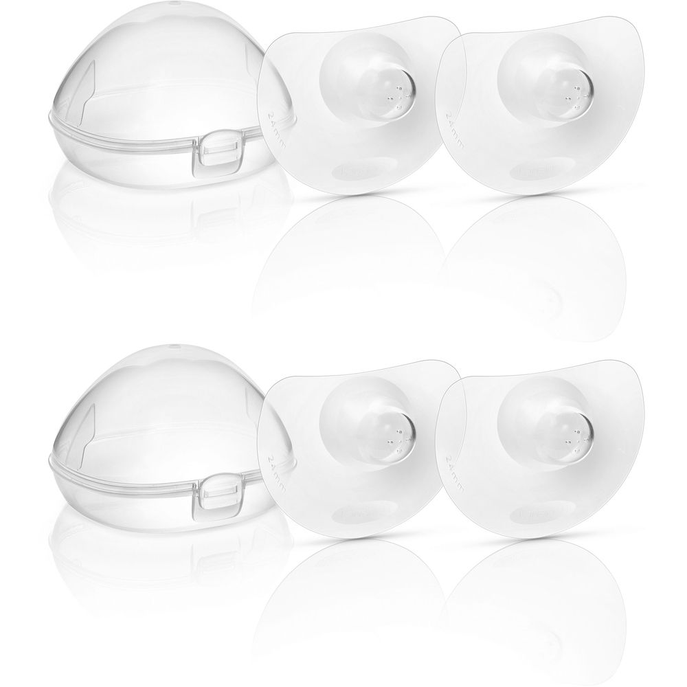 Stillhütchen und Aufbewahrungsboxen. Klare, runde Stillhütchen mit zentralem Nippel. Zwei Boxen mit Deckel.