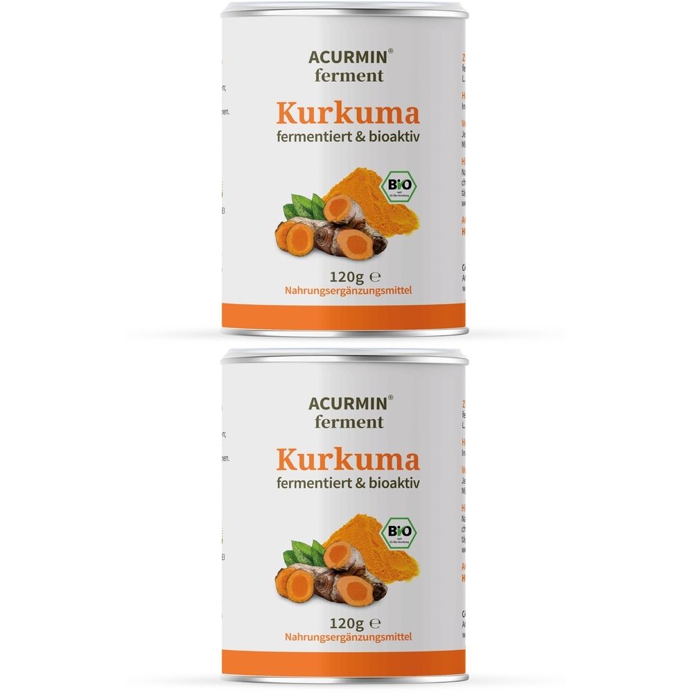 Zwei Dosen ACURMIN ferment Kurkuma. Aufschrift: Kurkuma fermentiert & bioaktiv, Bio-Siegel, 120g. Abbildung von Kurkuma-Wurzeln.