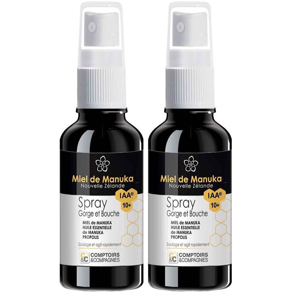 Zwei Flaschen Spray mit schwarzem Glas, weißem Sprühkopf und Etikett. Aufschrift: Miel de Manuka, IAA 10+.