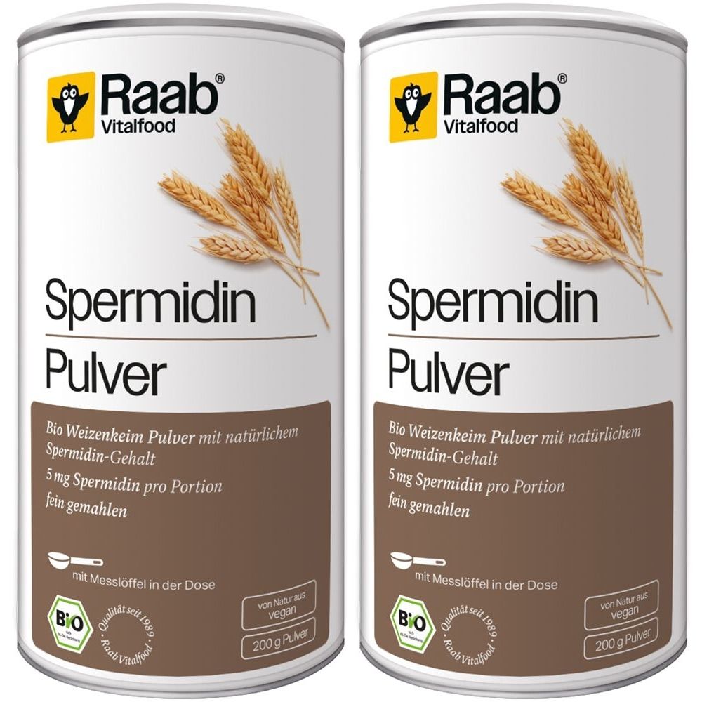 Zwei Dosen Raab Vitalfood Bio Spermidin Pulver. Weiße Dosen mit braunem Etikett, Produktname und Logo.
