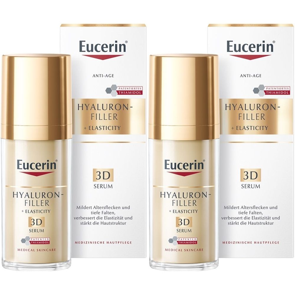 Mehrere Flakons und Verpackungen von Eucerin Hyaluron-Filler + Elasticity 3D Serum. Goldfarbene Deckel, weiße Verpackung mit Produktinformationen.