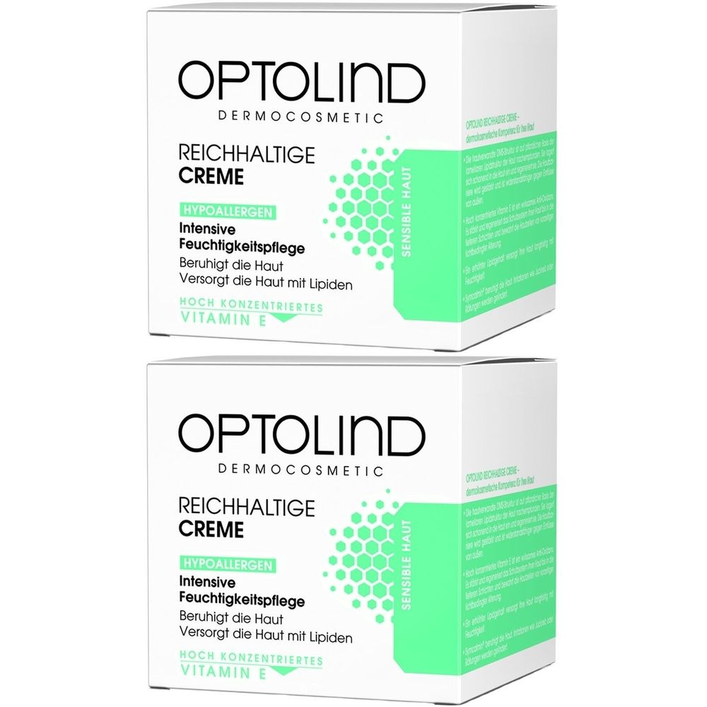 Zwei weiße Kartons mit Produktaufdruck. Aufschrift: OPTOLIND, REICHHALTIGE CREME, HYPOALLERGEN, VITAMIN E. Für sensible Haut.
