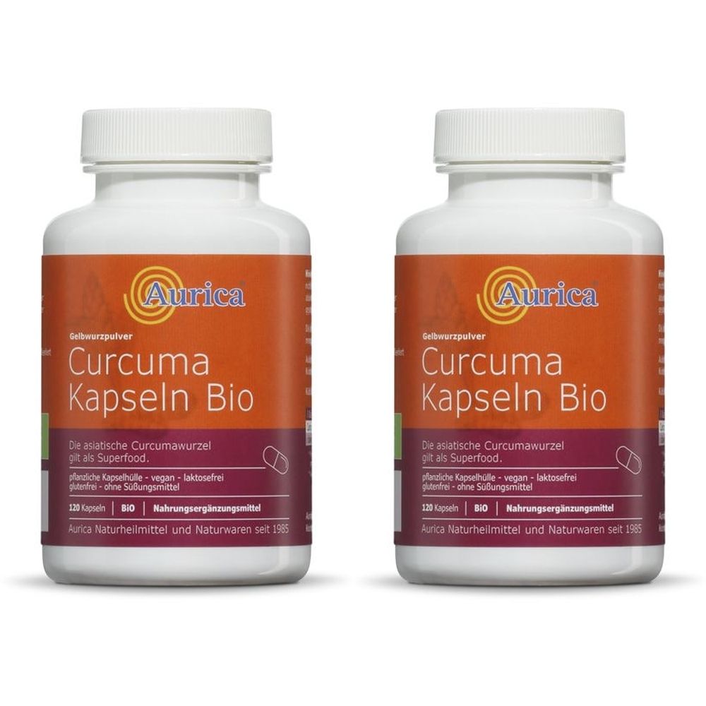 Zwei weiße Flaschen mit orangefarbenen Etiketten. Aufschrift: Aurica Curcuma Kapseln Bio. Sichtbar: Kapseln, Bio-Siegel.