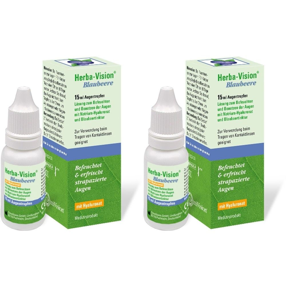 Zwei Flaschen und zwei Schachteln Herba-Vision Blaubeere Augentropfen. Weiße Flaschen, grüne und blaue Verpackung.