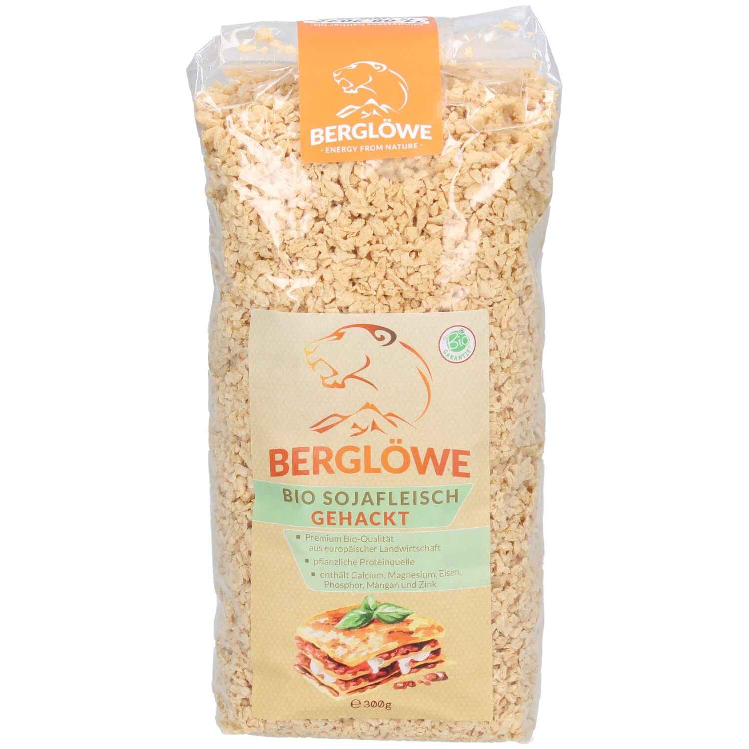 Klare Plastiktüte mit BIO Sojafleisch Gehacktes. Aufdruck: BERGLÖWE, Logo, Produktbild Lasagne, grüne Siegel.