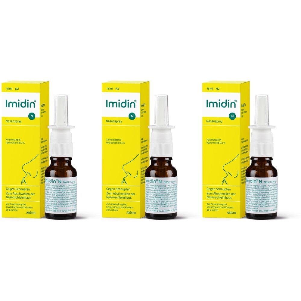 Drei Packungen und Flaschen von Imidin® N Nasenspray. Gelbe Schachteln mit weißer Aufschrift und braune Flaschen mit Sprühaufsatz.