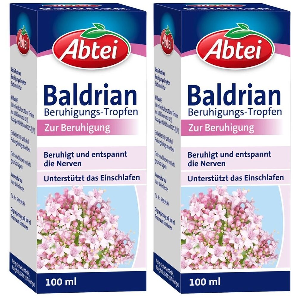 Zwei Schachteln Abtei Baldrian Beruhigungs-Tropfen. Blaue und weiße Verpackung mit Produktnamen und floralem Motiv. 100 ml.