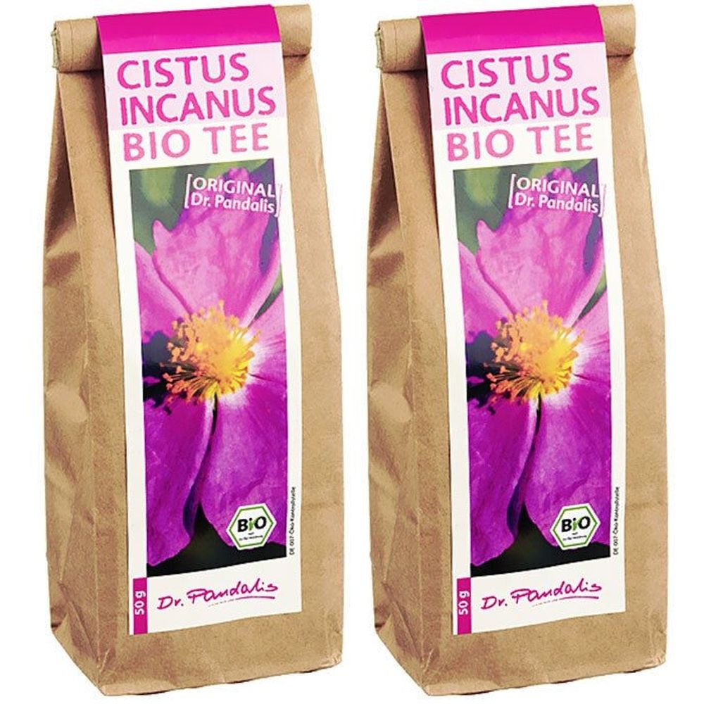 Zwei Beutel Cistus Incanus Bio Tee. Aufdruck mit Blüte, Bio-Siegel und Schriftzug. Braune Papierverpackung mit pinkfarbenem Etikett.
