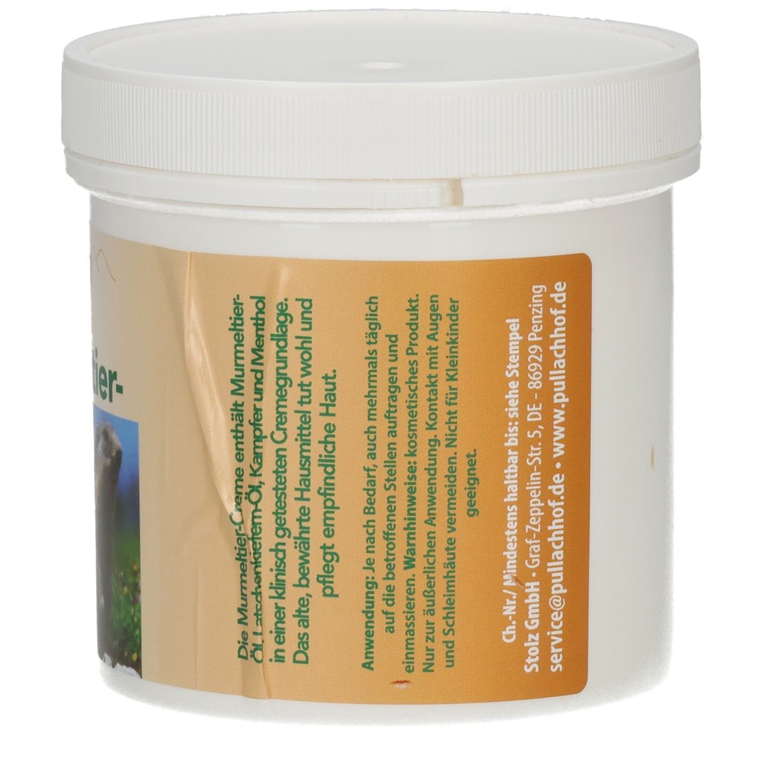 Rückseite des Behälters mit weißem Deckel. Braunes Etikett mit Text über Anwendung und Inhaltsstoffe.