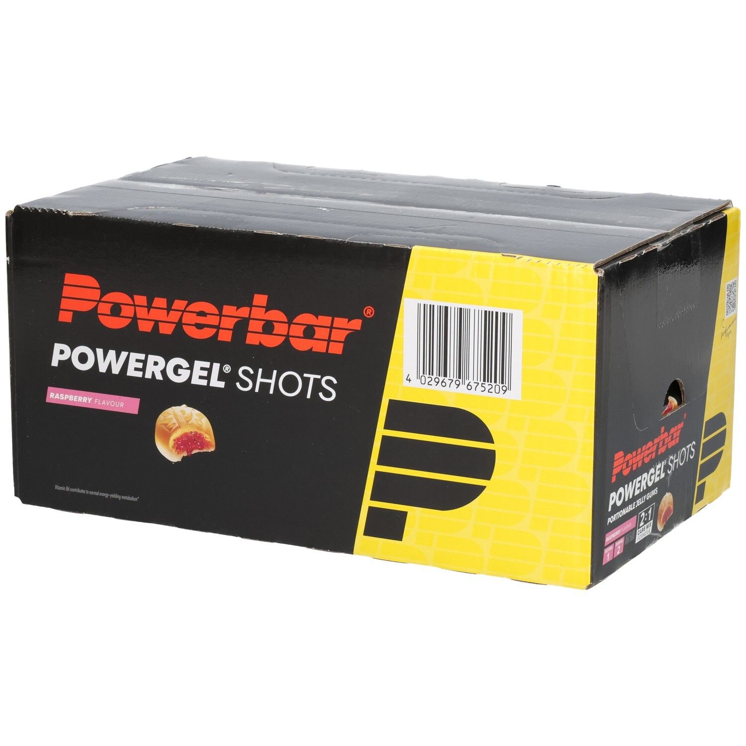 Schwarzer Karton mit Powerbar Powergel Shots. Aufdrucke: Himbeere, Barcode, Piktogramm. Gelbe und rote Akzente.