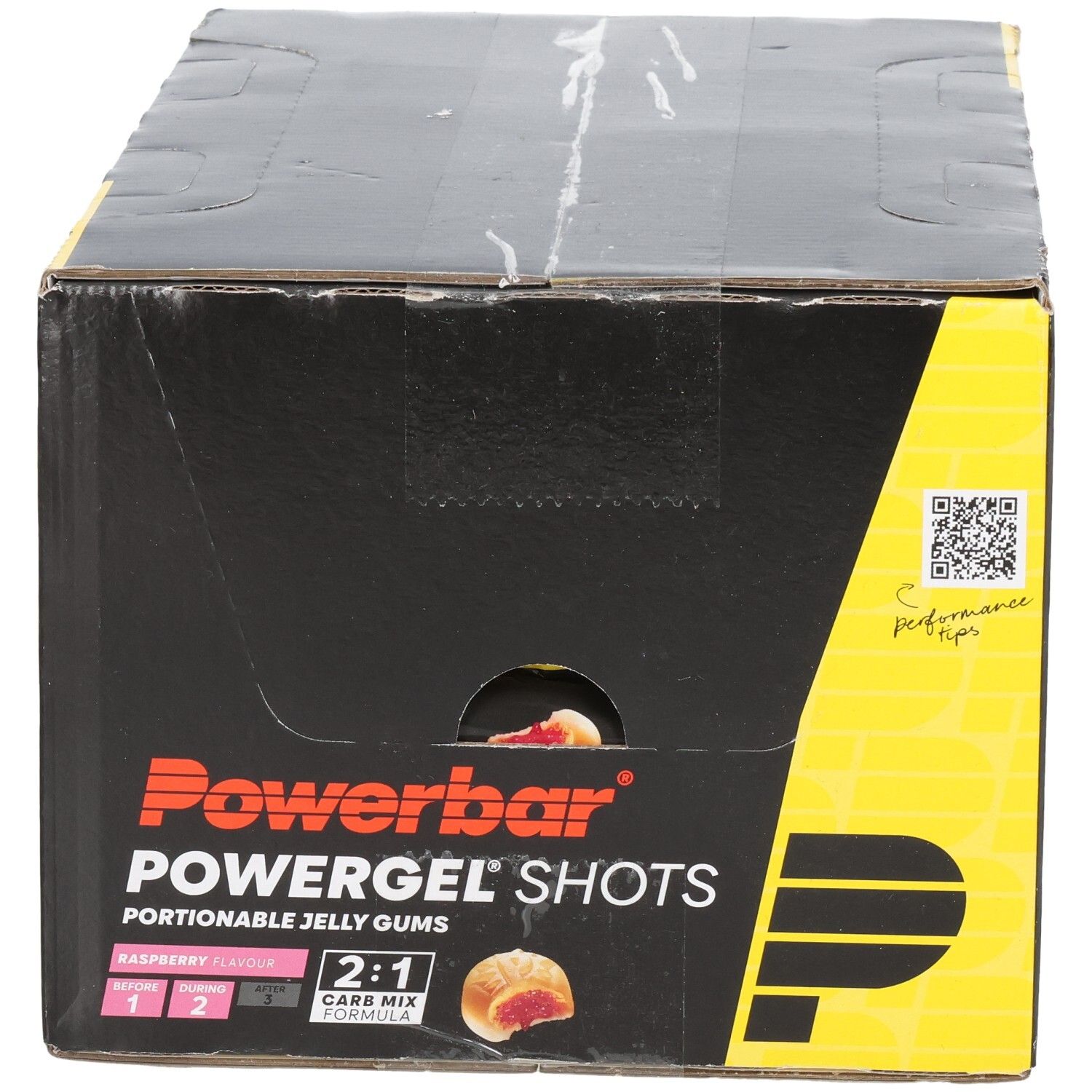Schwarzer Karton mit Powerbar Powergel Shots. Aufdrucke: Himbeere, 2:1 Carb Mix, Piktogramme. Gelbe und rote Akzente.