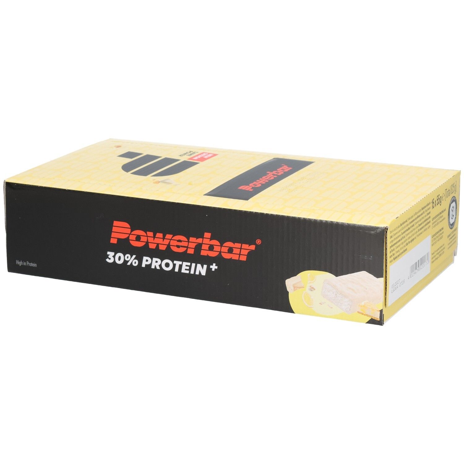 Gelbe Powerbar-Verpackung mit schwarzem Logo und Schriftzug. Enthält 30% Protein+. Aufdruck: Lemon Cheesecake. Neue Design-Kennzeichnung.