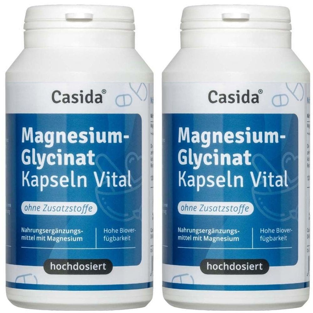Zwei weiße Flaschen mit blauem Etikett. Aufschrift: Casida Magnesium-Glycinat Kapseln Vital. Zusatzinformationen.