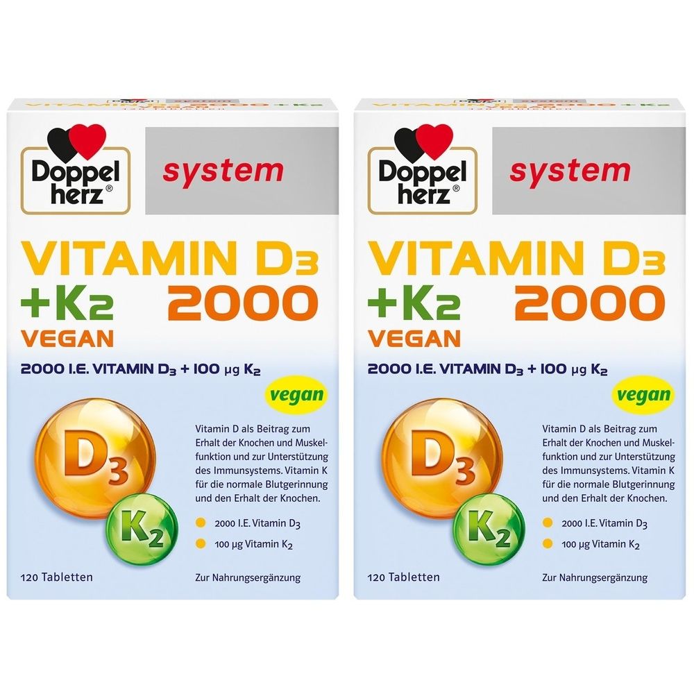 Zwei Packungen Doppelherz Vitamin D3 + K2 2000 Vegan. Weiße Schachteln mit Produktinformationen und Logos.