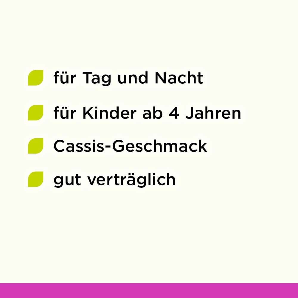 Text-Grafik mit grünen Punkten. Text: für Tag und Nacht, für Kinder ab 4 Jahren, Cassis-Geschmack, gut verträglich. Hintergrund: rosa-grün.