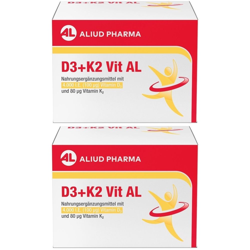 Zwei weiße Kartons mit roter und gelber Schrift. Aufschrift: D3+K2 Vit AL, Nahrungsergänzungsmittel. Marke: ALIUD PHARMA.