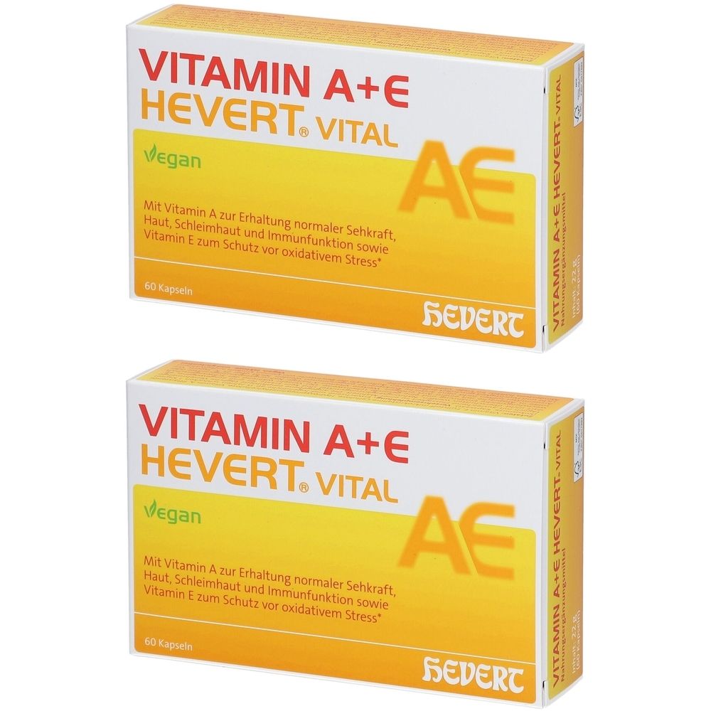 Zwei Schachteln VITAMIN A+E HEVERT. VITAL. Weiße und gelbe Verpackung mit Produktnamen und AE-Logo. Vegan.