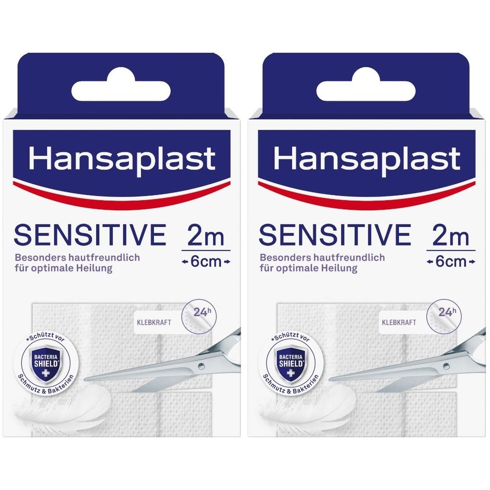 Zwei Packungen Hansaplast Sensitive Pflaster. Weiße Verpackung mit blauem Logo und Produktbezeichnung. Enthält Pflaster und Schere.