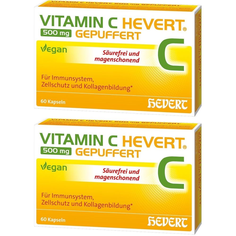 Zwei gelbe Schachteln mit "VITAMIN C HEVERT® 500 mg GEPUFFERT". Text: "Vegan", "Säurefrei und magenschonend". 60 Kapseln.