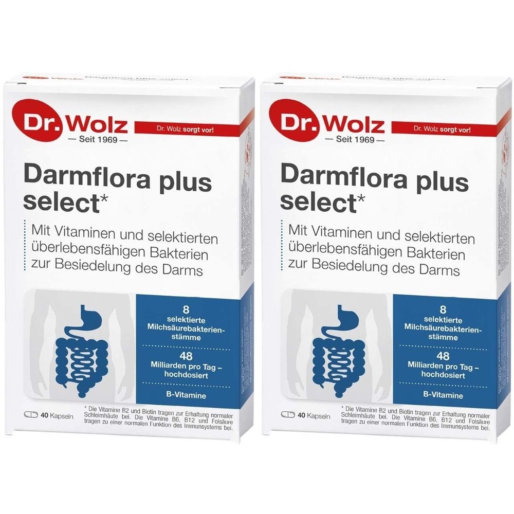 Zwei Kartons mit "Dr. Wolz Darmflora plus select". Aufdrucke: Bakterienstämme, Vitamine, 40 Kapseln. Weiß, rot, blau.