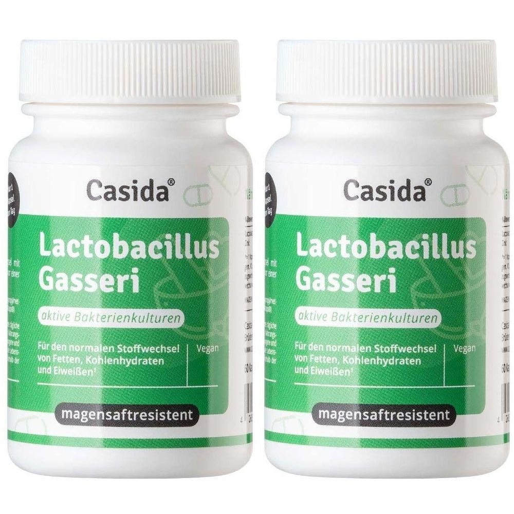 Zwei weiße Flaschen mit Schraubverschluss. Aufschrift: Casida Lactobacillus Gasseri. Grüne Etiketten mit Text. Vegan.